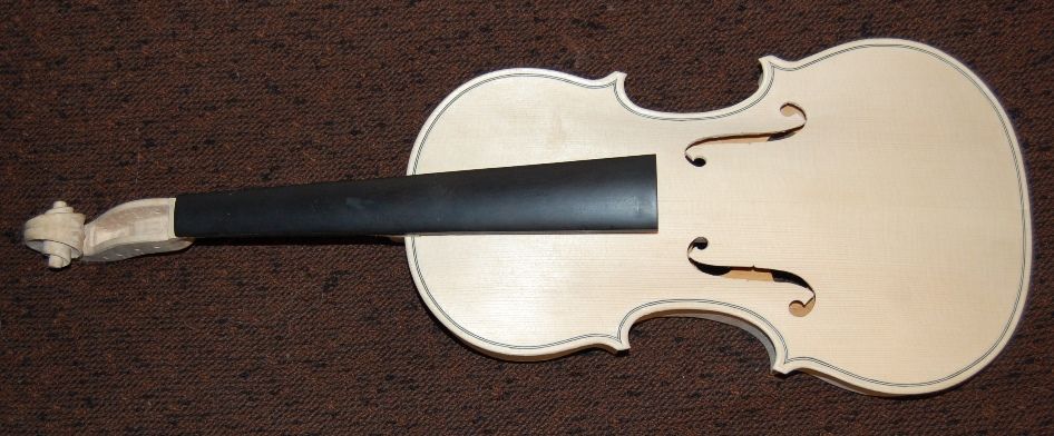 Front view of instrument with neck installed, and mold still in place.
