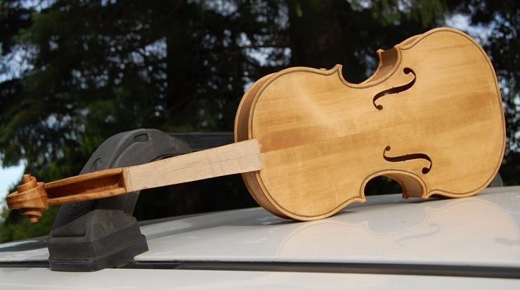 Five String Fiddle Front with first coat of sealr, drying in the sun.