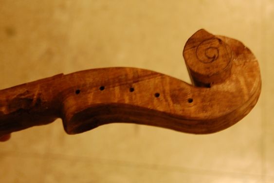 Treble side of unfinished scroll.