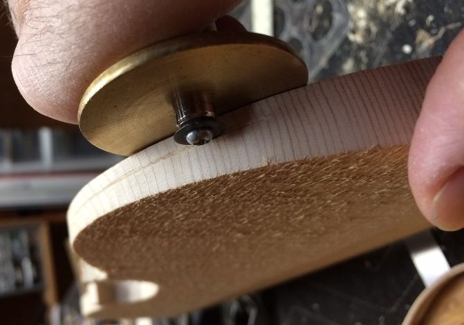 Using a wheel marking gauge to scribe the edge thicknesses.