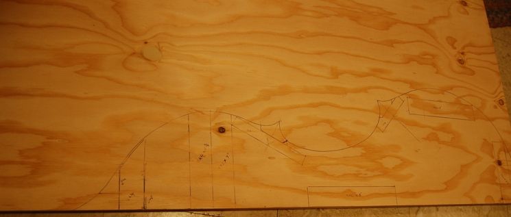design traced onto mold plywood