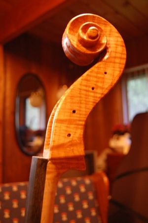 Cello scroll with one coat of varnish.