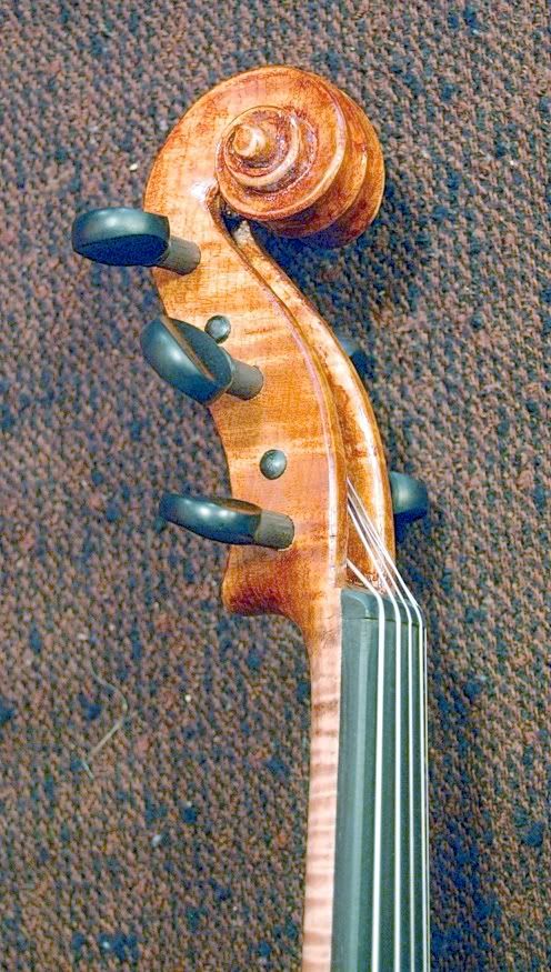 Scroll of an Oliver Five-string Fiddle.