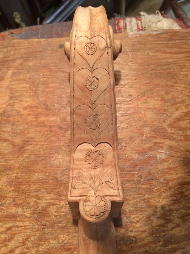 Five string cello scroll back carving begun.