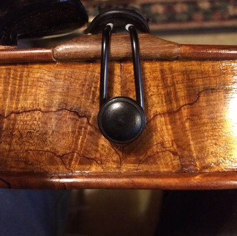 Completed end button with tailpiece of the Five-String Fiddle.